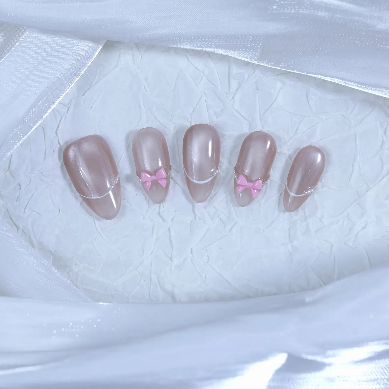 Elegant Pink Bow Press-on Almond Nails with Silver Accents