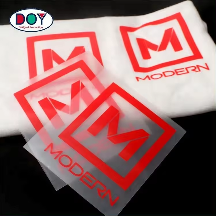 Наклейки силиконовые термо 3D с логотипом для одежды