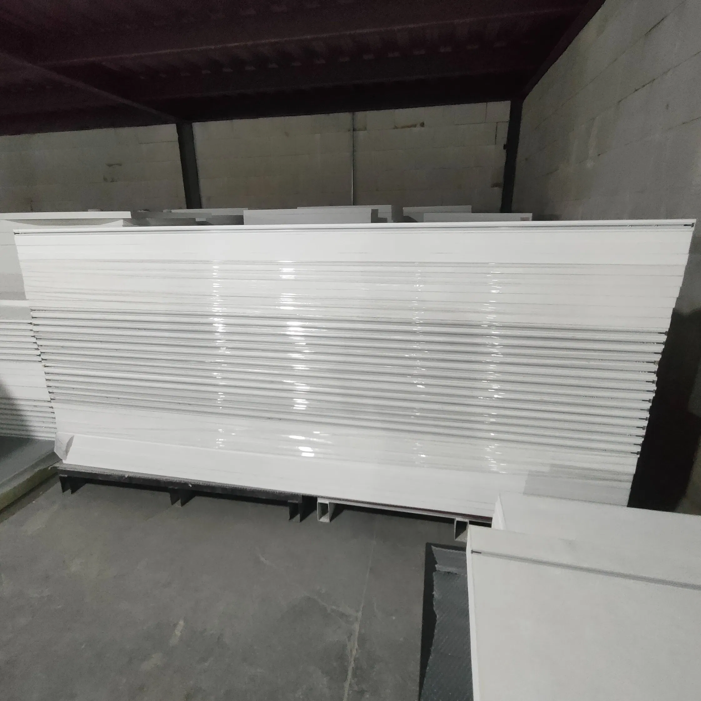 Custom-Length Fiberglass Baffles with Nrc 0.9 and Modular Connectors for Variable Ceiling Heights in Retail Stores
