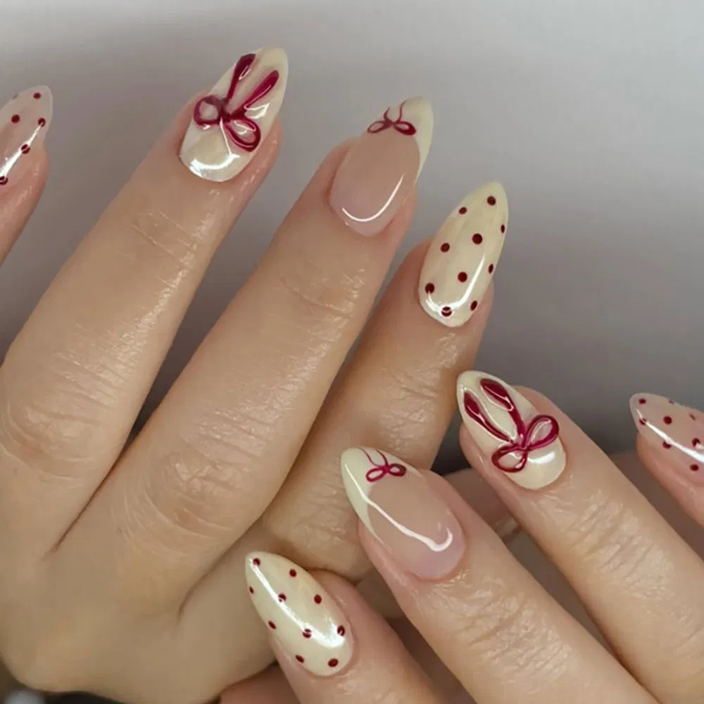 Adorable Pink Almond Press-on Nails with Charming Red Bow
