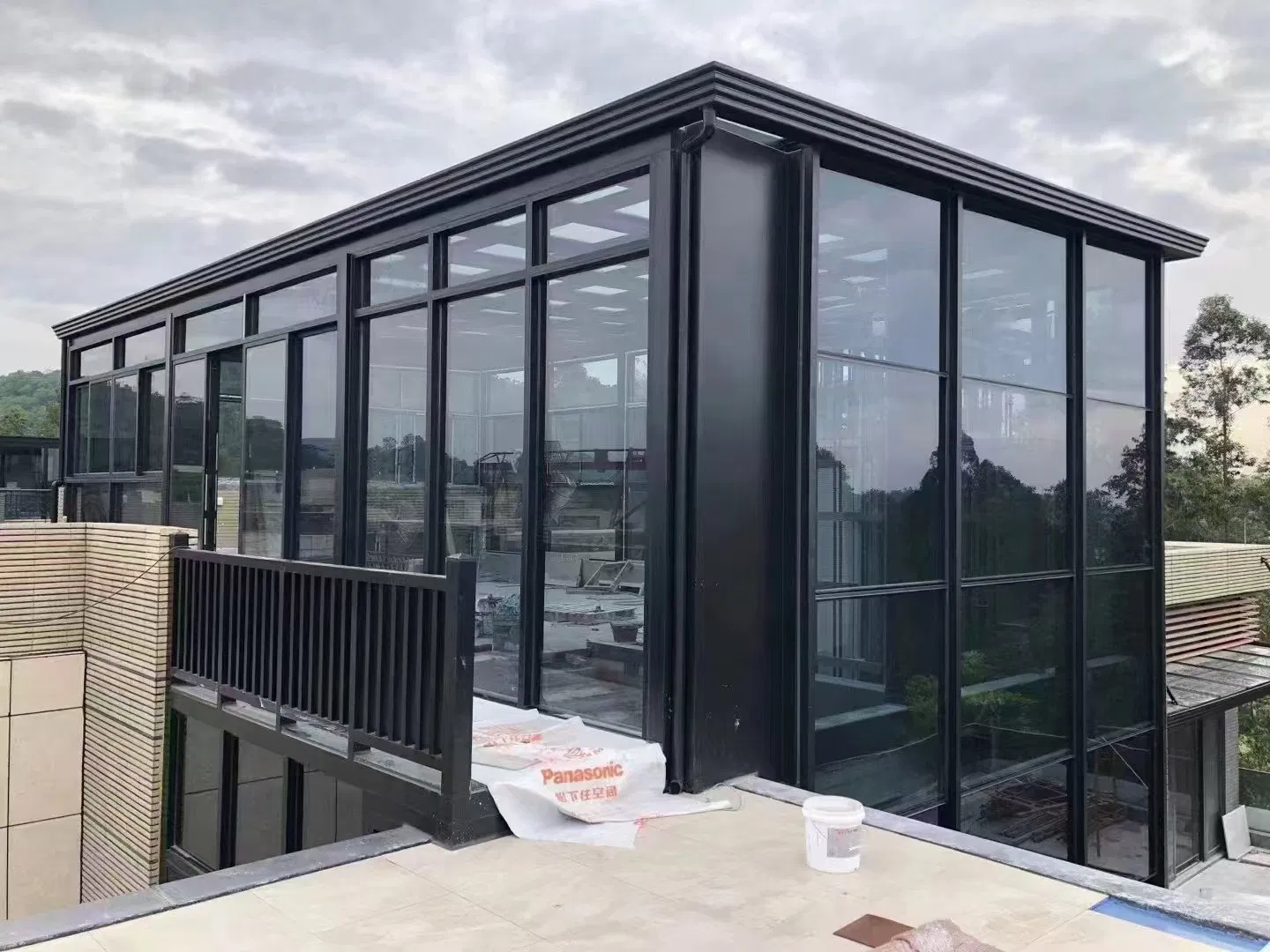 The Innovative Sunroom Features a Durable Aluminum-Glass Design.