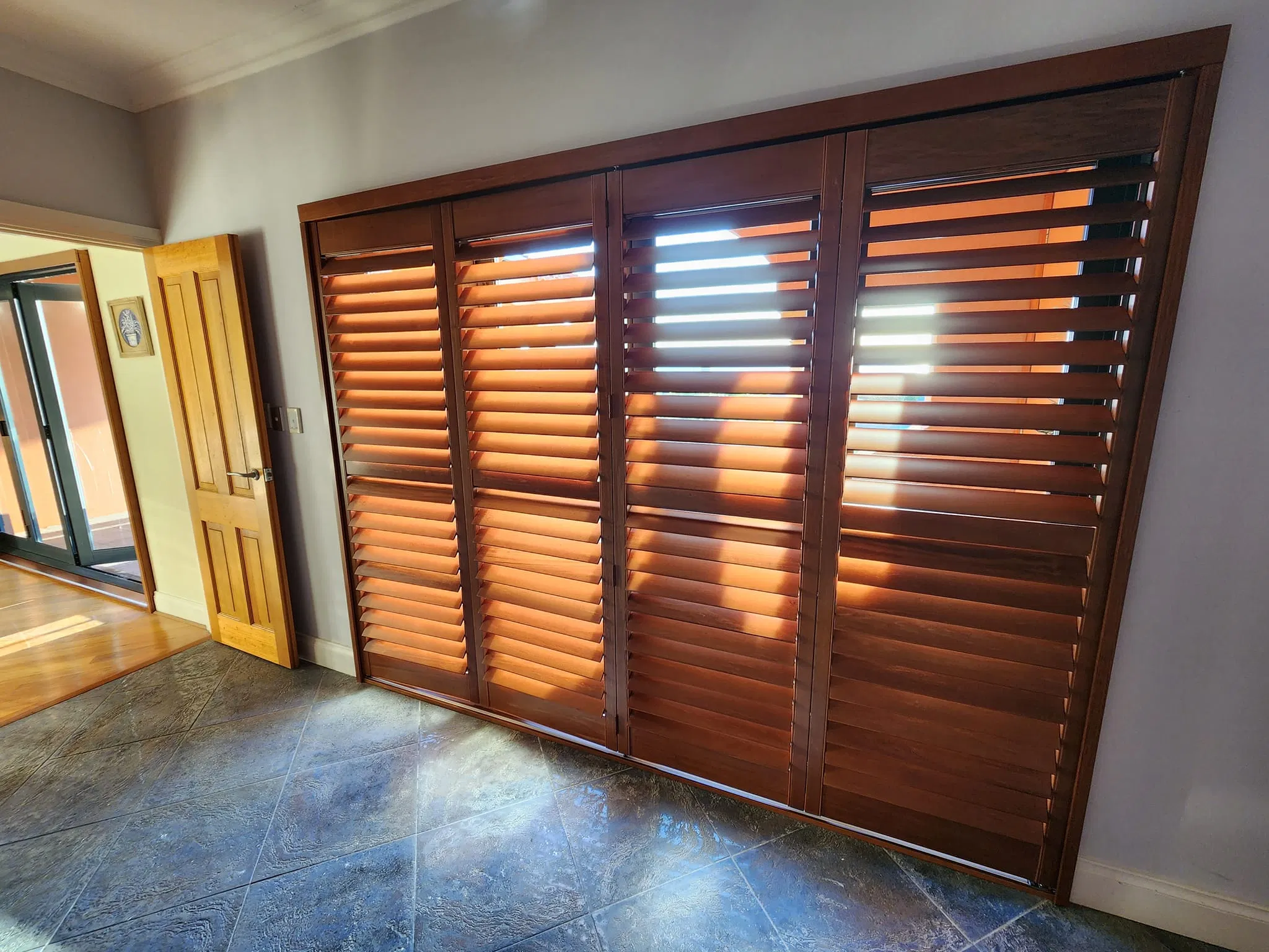 Sliding Bi-Fold Shutters Can Be Folded Back Along The Track