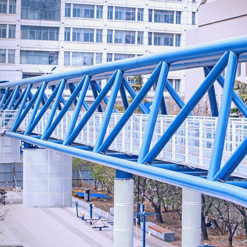 Industrial-Grade Steel Overcrossing Bridge for Protected Pedestrian Access