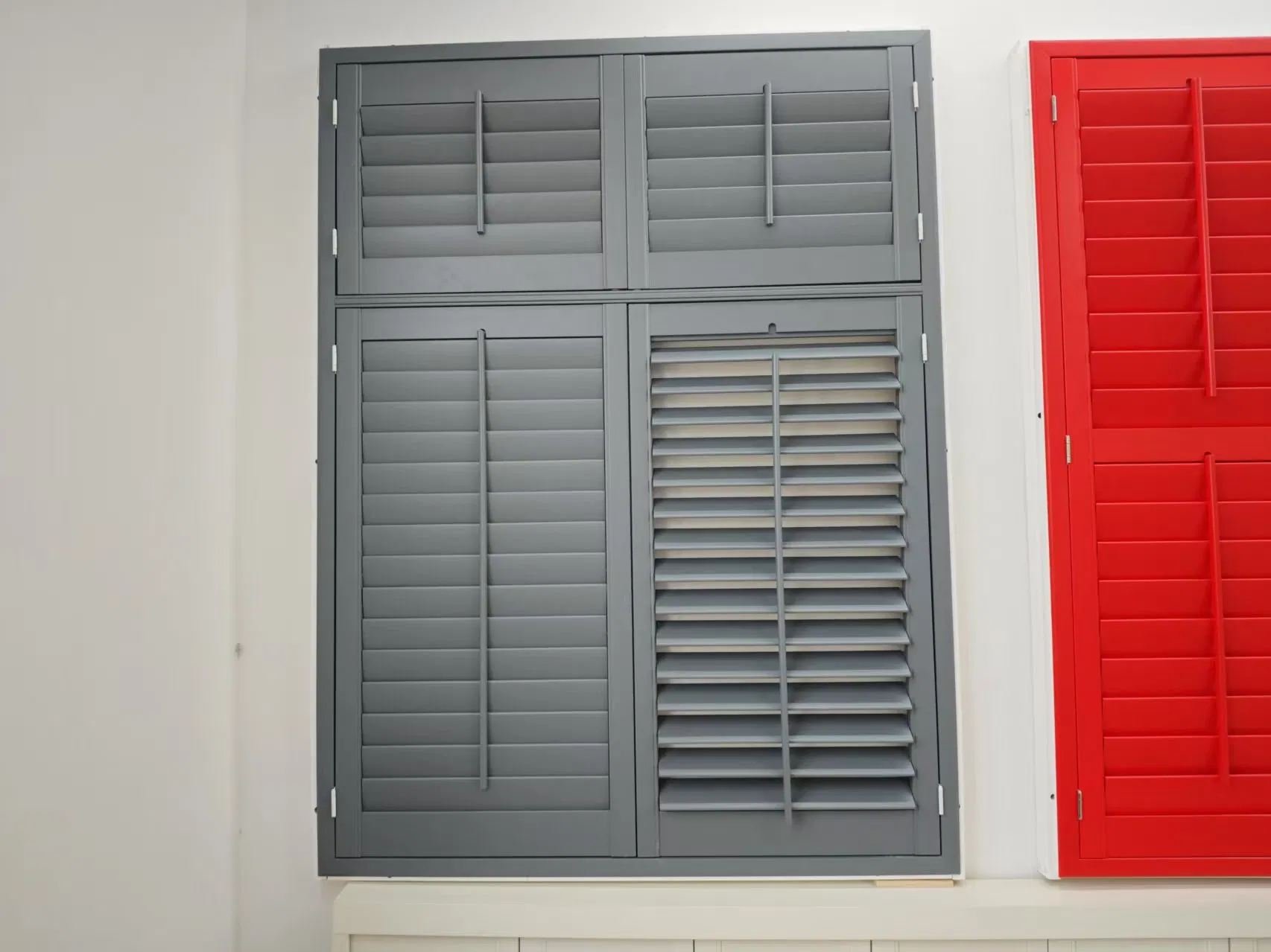 Tier on Tier Window Shutters with a Horizontal Tpost
