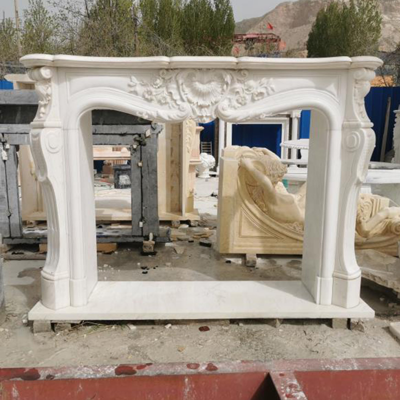 Камин из мрамора и известняка ручной работы