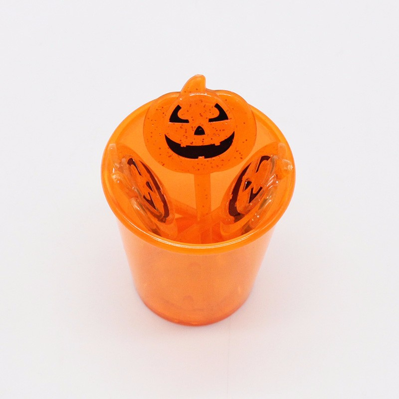 Vibrant Halloween Pumpkin Forks for Creative Fruit Serving