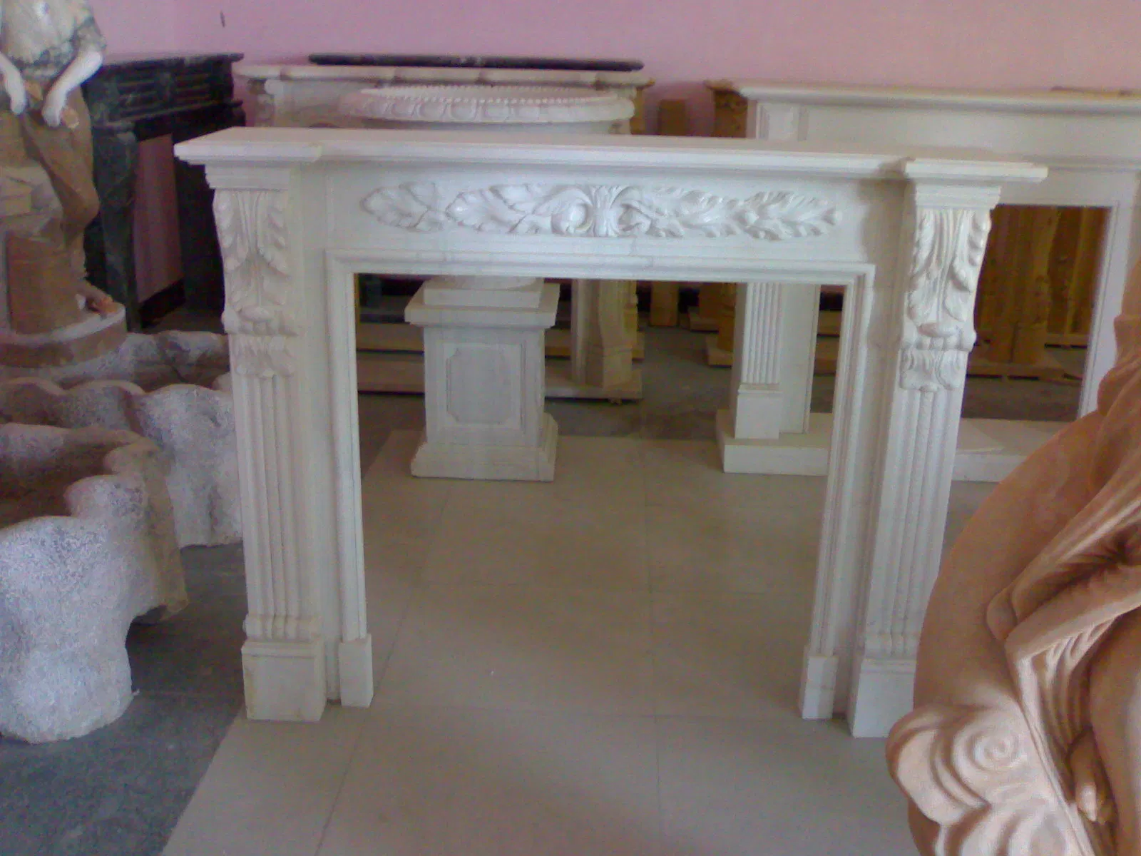 China Wholesale Limestone Interior Decoration Modern Style Hand Made Carved Marble Fireplace Mantel Design Price