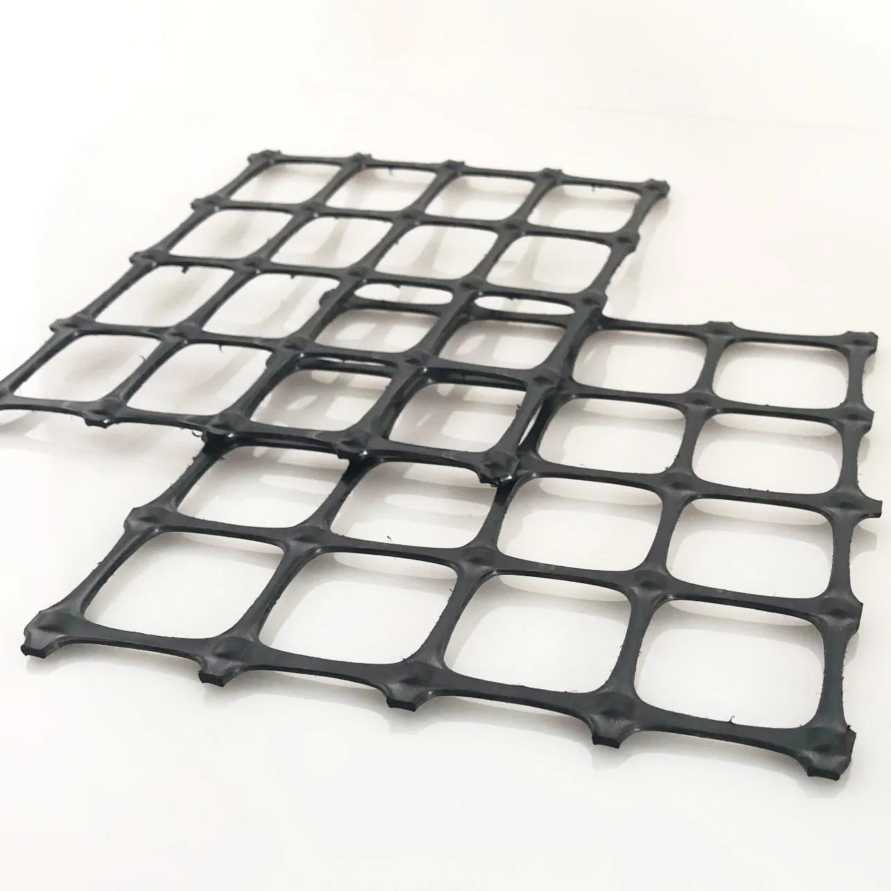 PP Polyethylene Biaxial Geogrid Plastic Mesh for Base Soil Reinforcement Construction Garden Fence