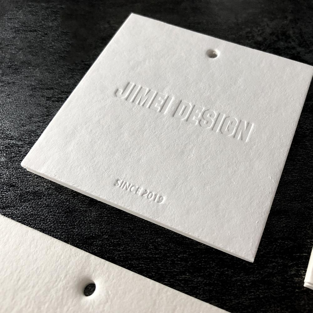 Бирки для одежды с тиснением логотипа