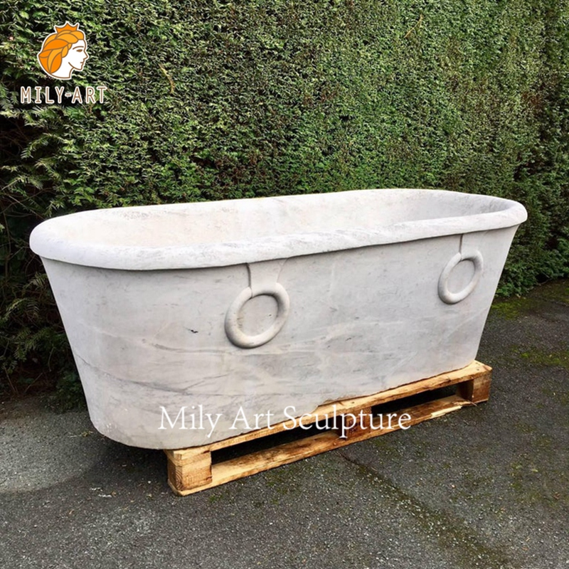 Белая мраморная ванна овальная отдельностоящая