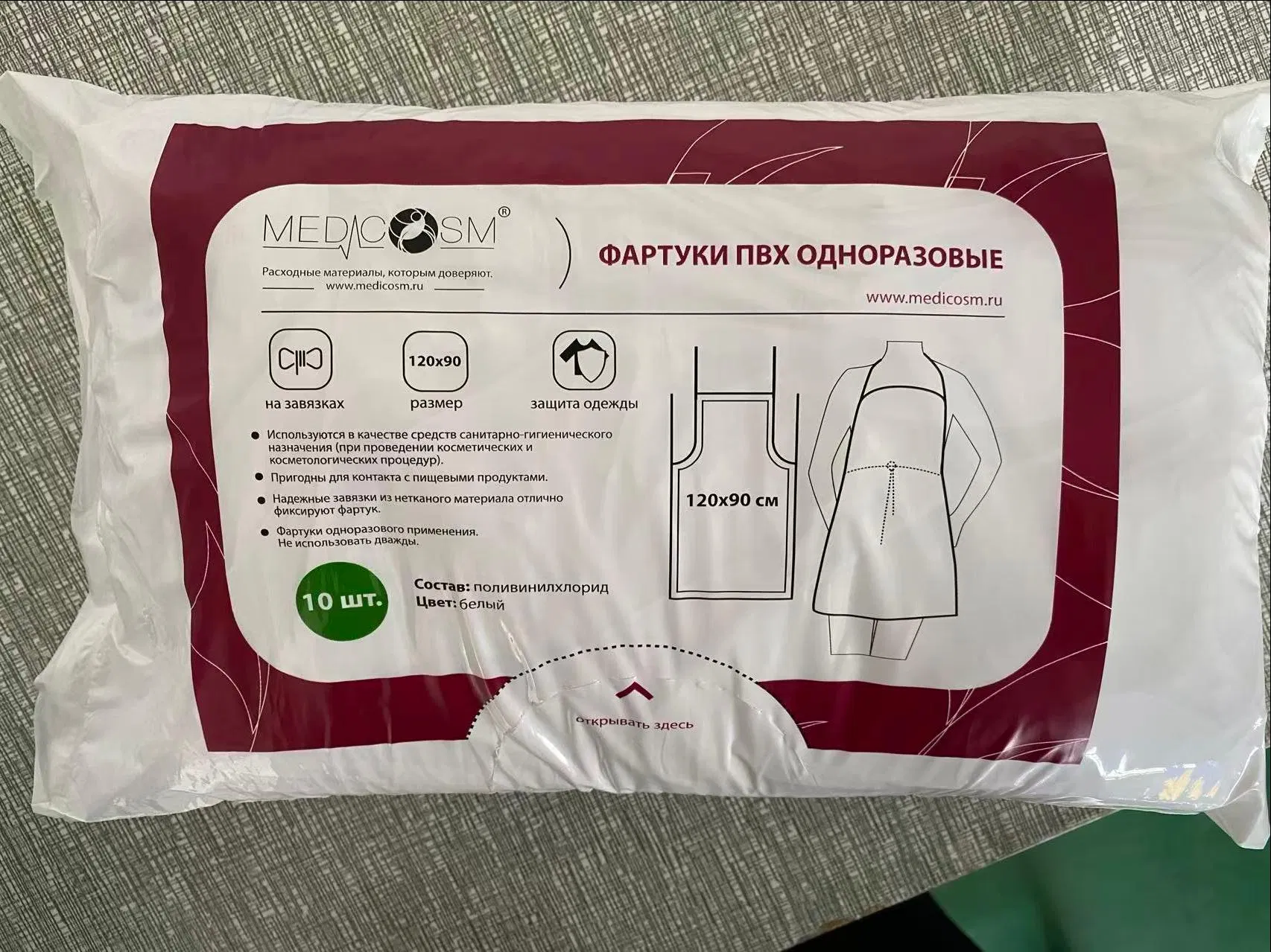 Cheaper White Disposable PVC Apron Non-Woven Sewing Edge Waterproof