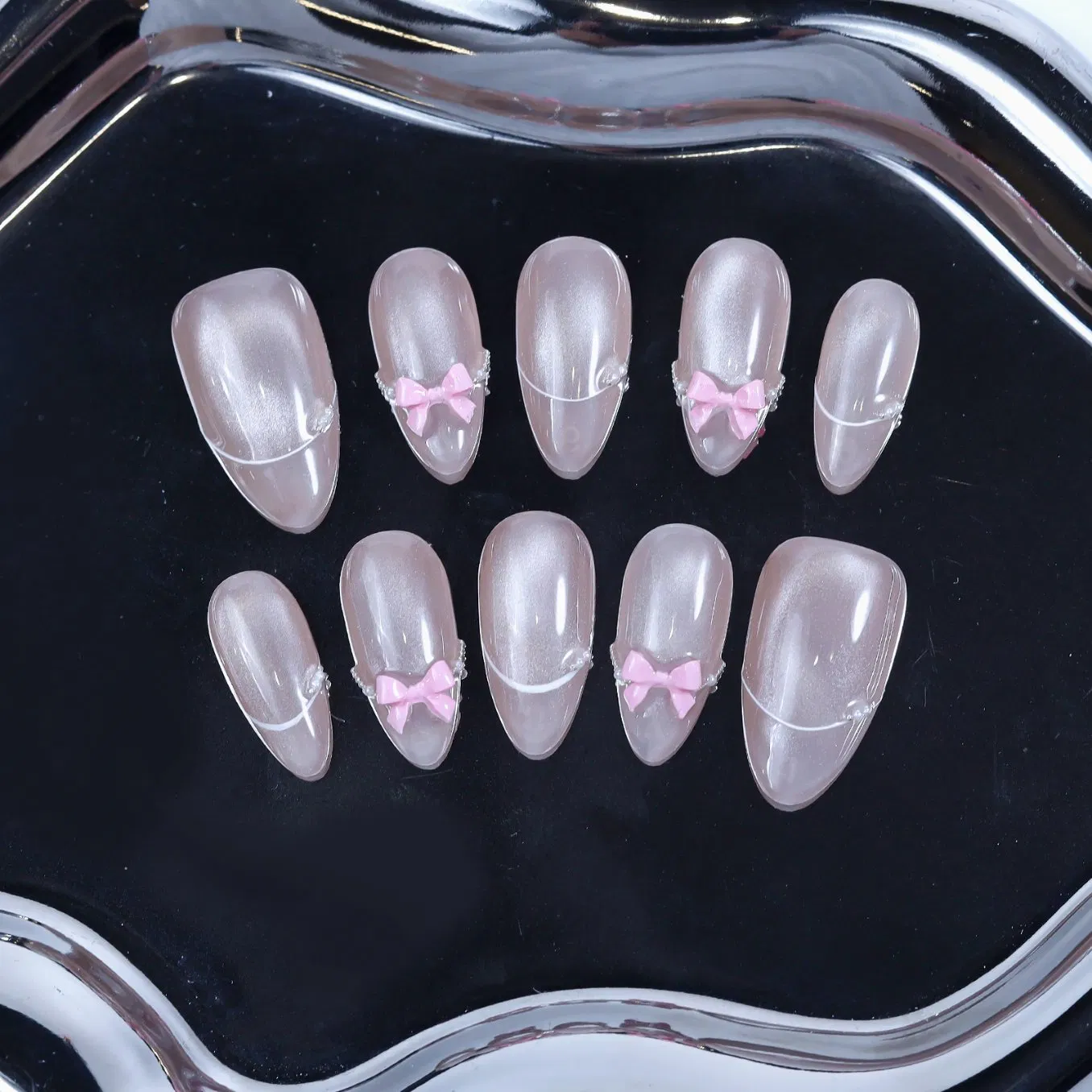 Elegant Pink Bow Press-on Almond Nails with Silver Accents