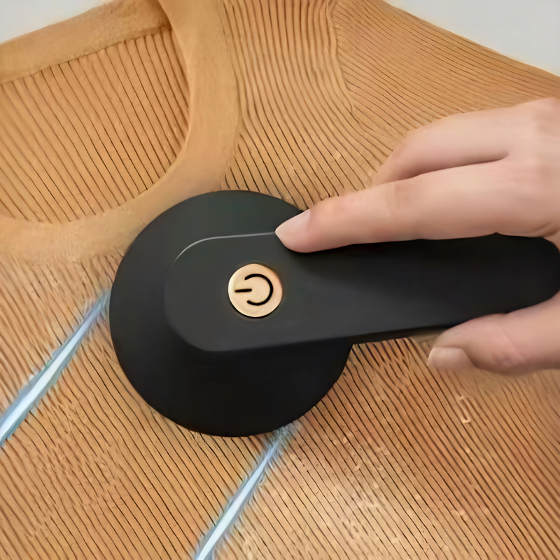 a Small Portable Ball Remover with Electric Charging