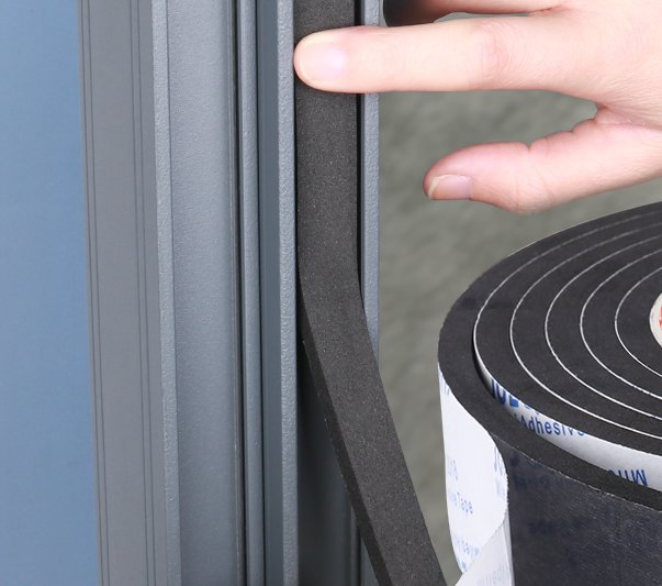 Pre-Compressed Multifunctional Foam Tape for Sealing Against Air and Driving Rain