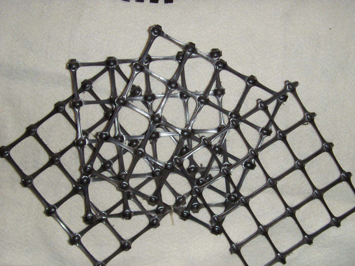 High Tensile Strength Basalt Fiber Mesh Geogrid PP Grille Mesh Uniaxial Plastic Geogrid/Pet One-Way Geogrid for Protective Soil