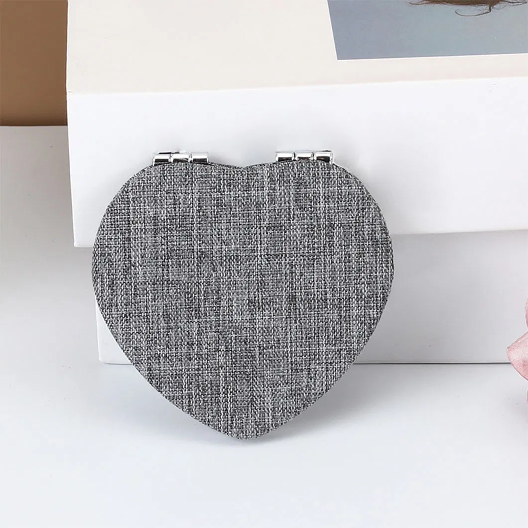 Selling New Wholesale PU Material Heart-Shaped Folding Double-Sided Mirror Clear and Easy to Carry Makeup Mirror