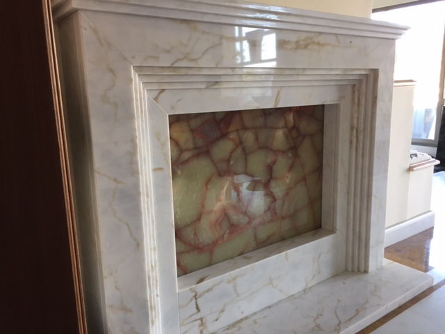 Elegant White Marble Fireplace with Classic Design for Homes