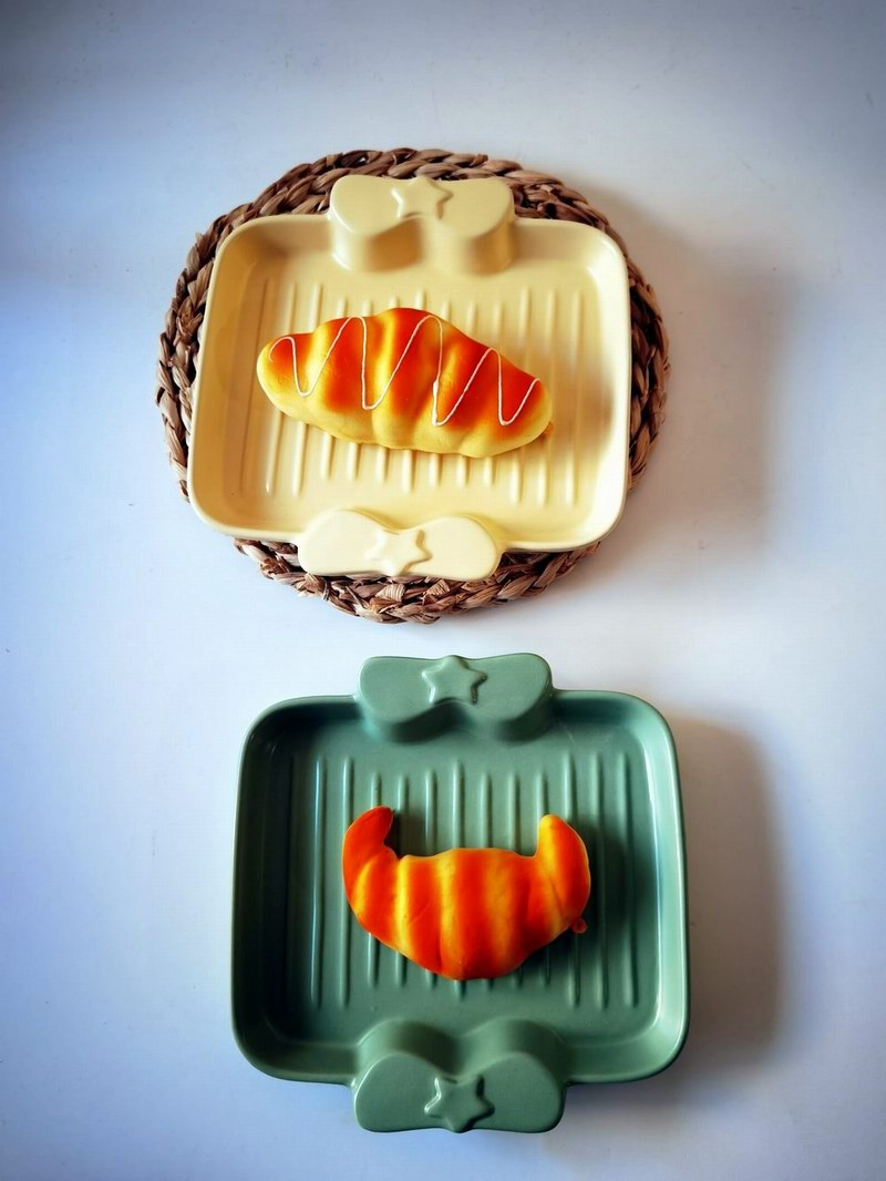 Manufacturer Hot Selling Personalized High Quality Color Glaze Ceramic Baking Dish with Bowknot Handle for Kitchen