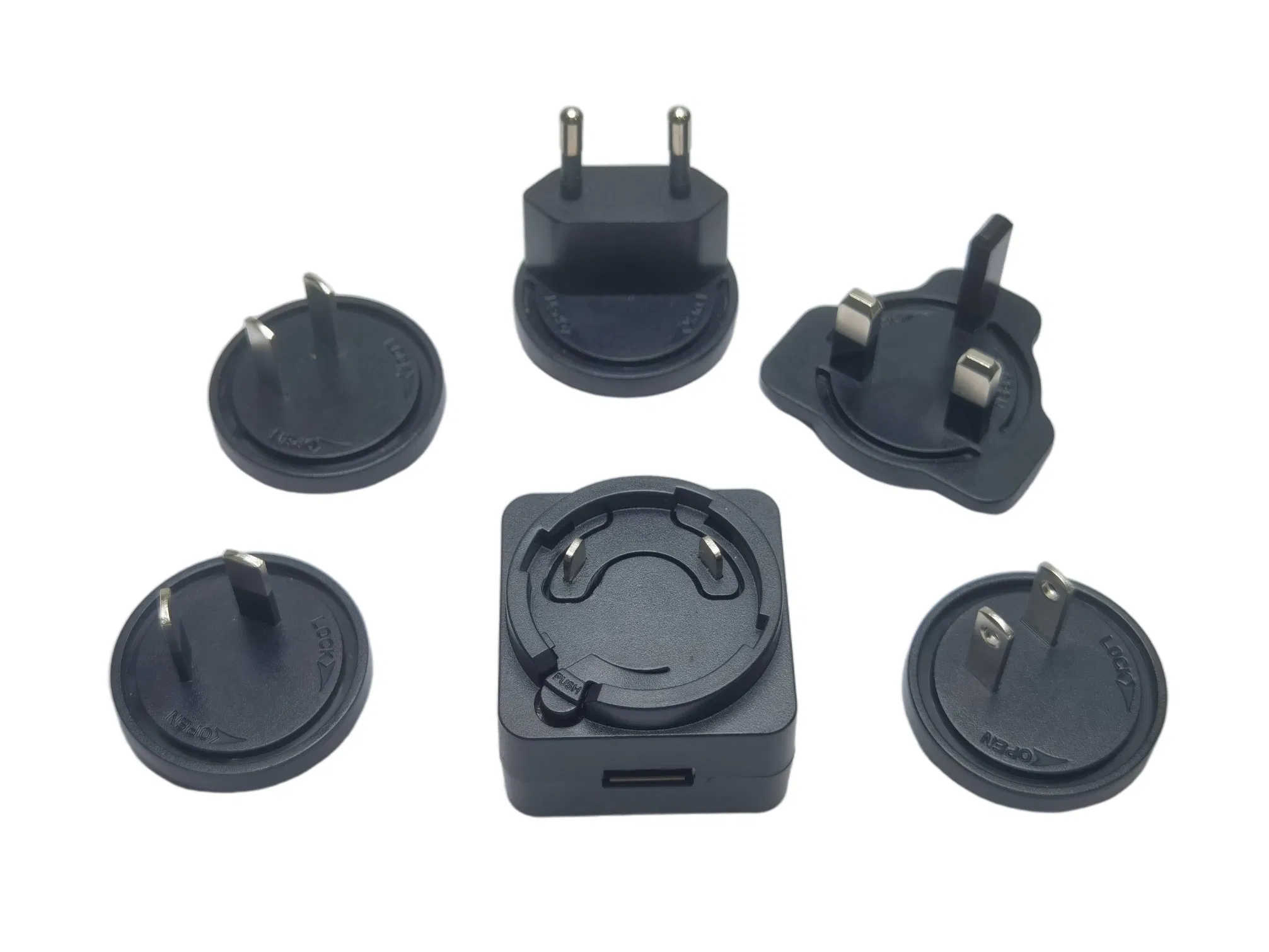 Зарядное устройство 12W USB с сменными вилками