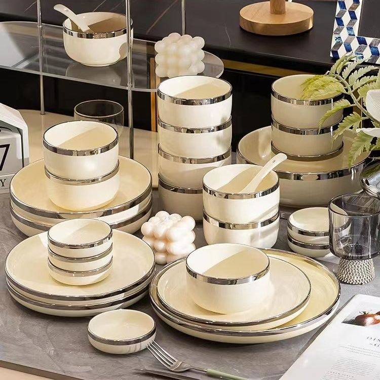 Elegant Light Yellow Ceramic Tableware Set with Silver Trim