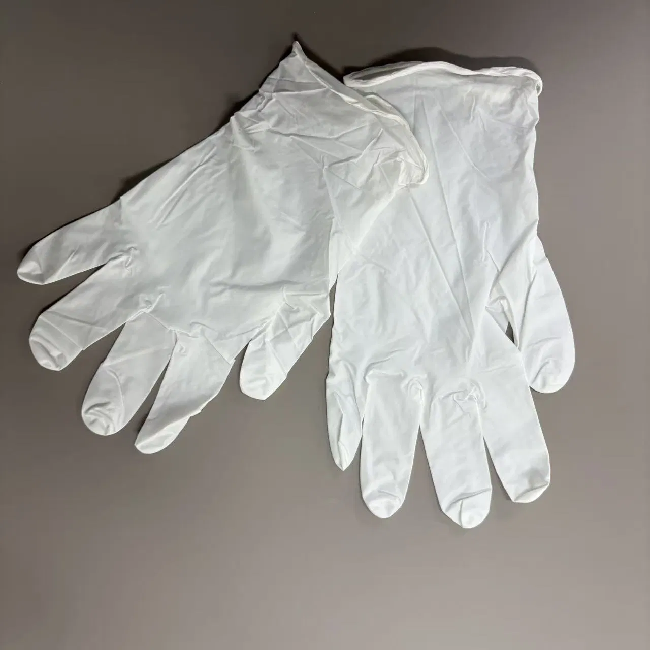White Nitrile Examination Gloves with Textured Fingertip Grip