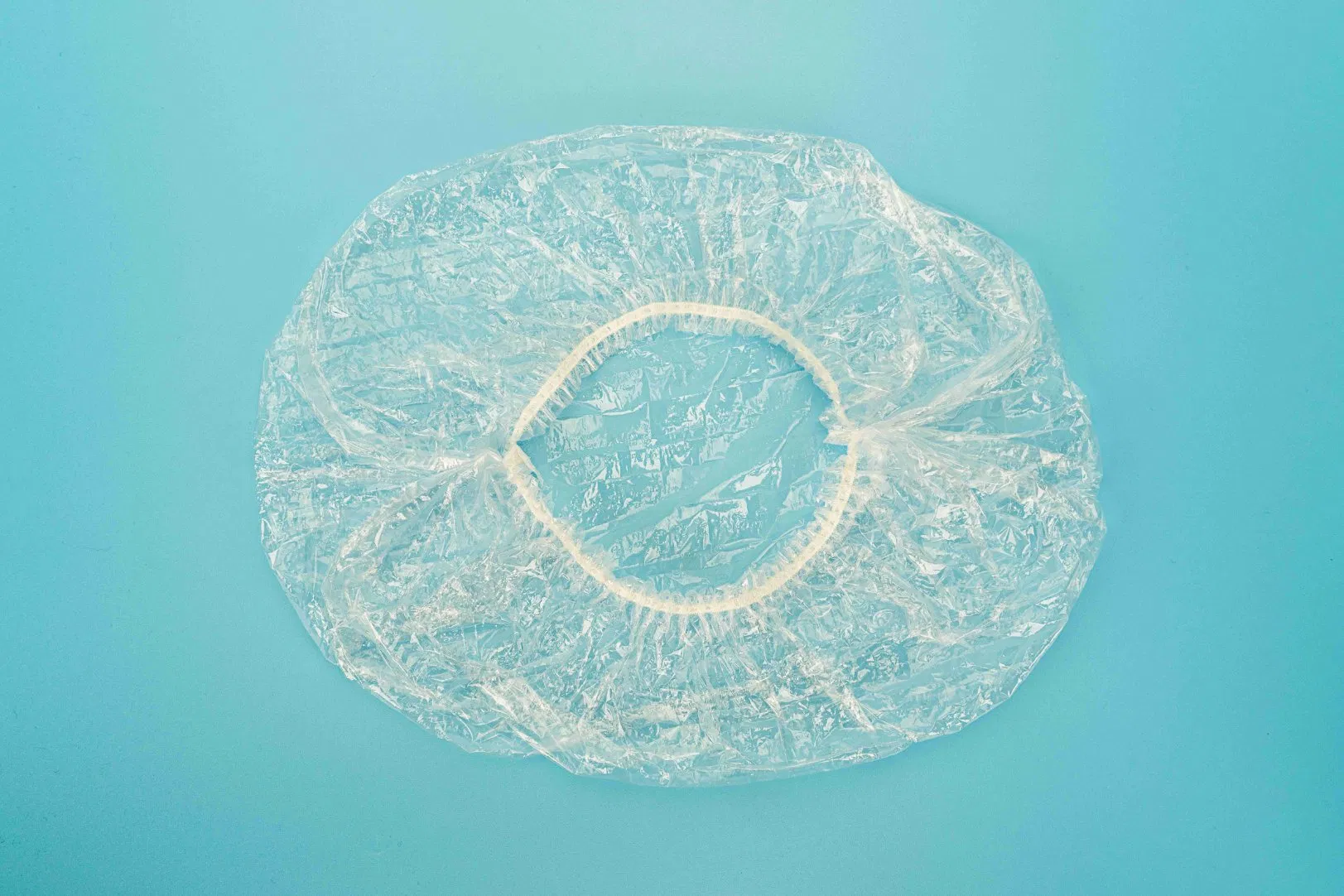 PE Disposable Waterproof Shower Cap for Hotel/Home Use Made by Hand
