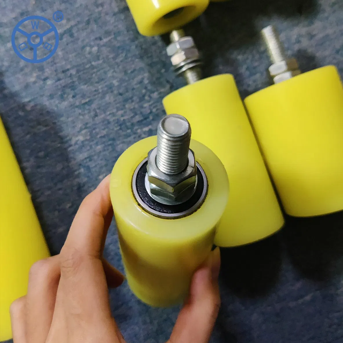 Wbd Factory Plastic/Nylon Sliding Roller Door Nylon Wheel 75-300 mm Mild Steel Conveyor Guide Used in Conveyor Roller