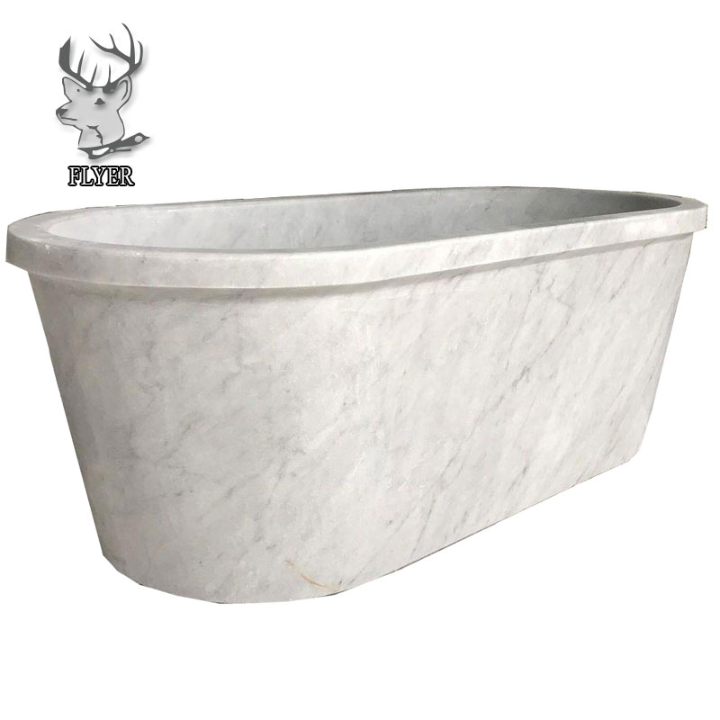 Белая мраморная ванна прямоугольная отдельностоящая