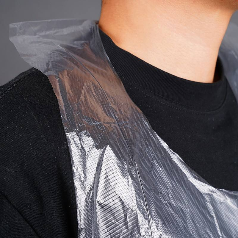 Disposable Transparent Sleeveless PE Apron for Household Cleaning Salon Hospital Use Large Size CE Certified