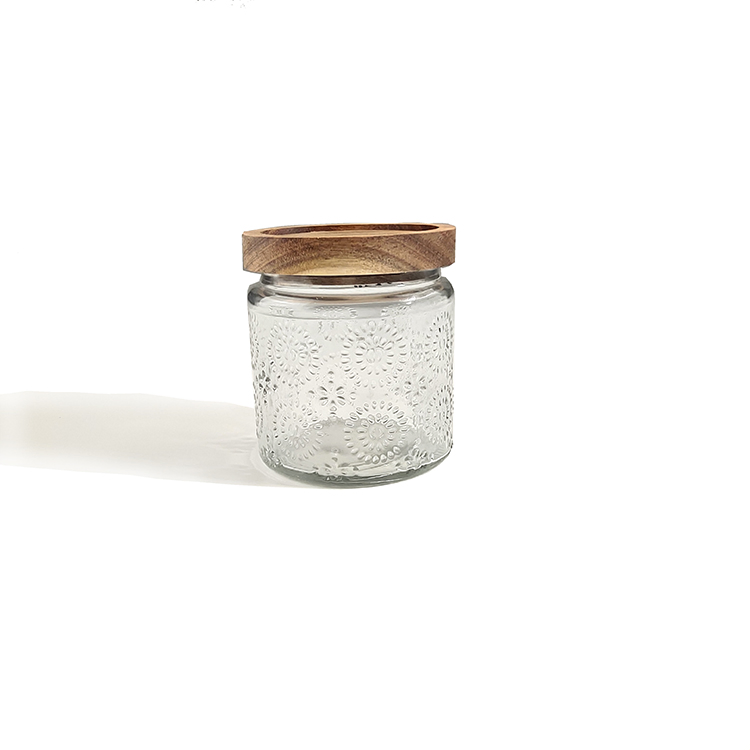 Стеклянная банка для хранения с цветком бегонии