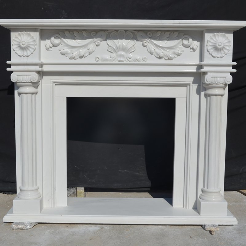 Камин из белого мрамора и известняка