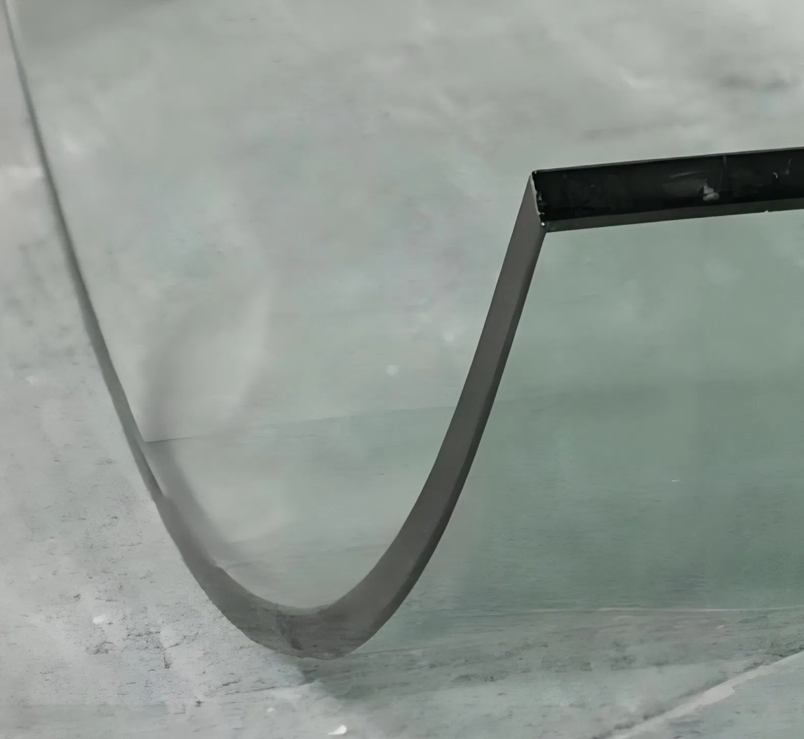 Elegant Safety Glass with Curved Design for Green Construction