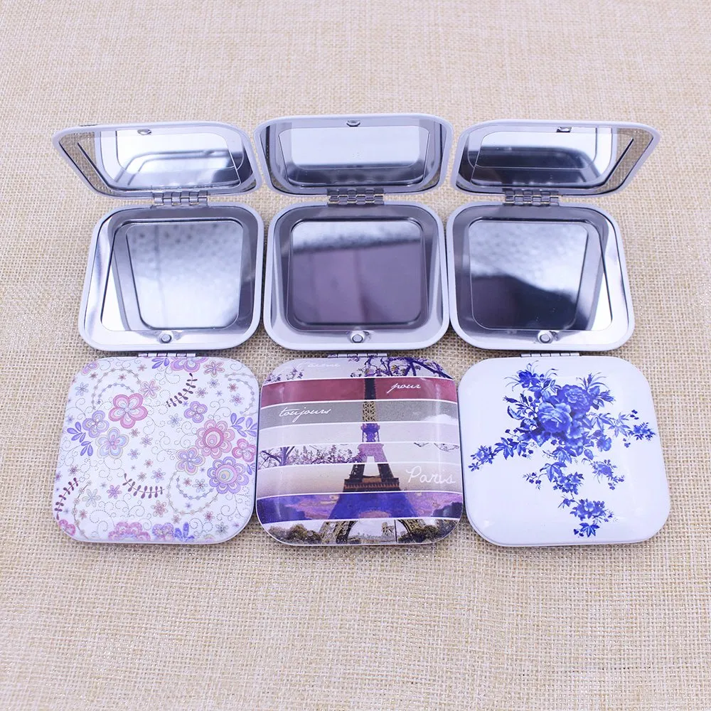 Elegant Metal Pocket Mirror with Reflective Cosmetic Surface