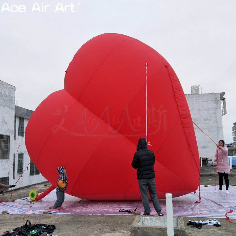 Giant 5m Tall Red Inflatable Heart with Blower for Valentine's Day Decorations.