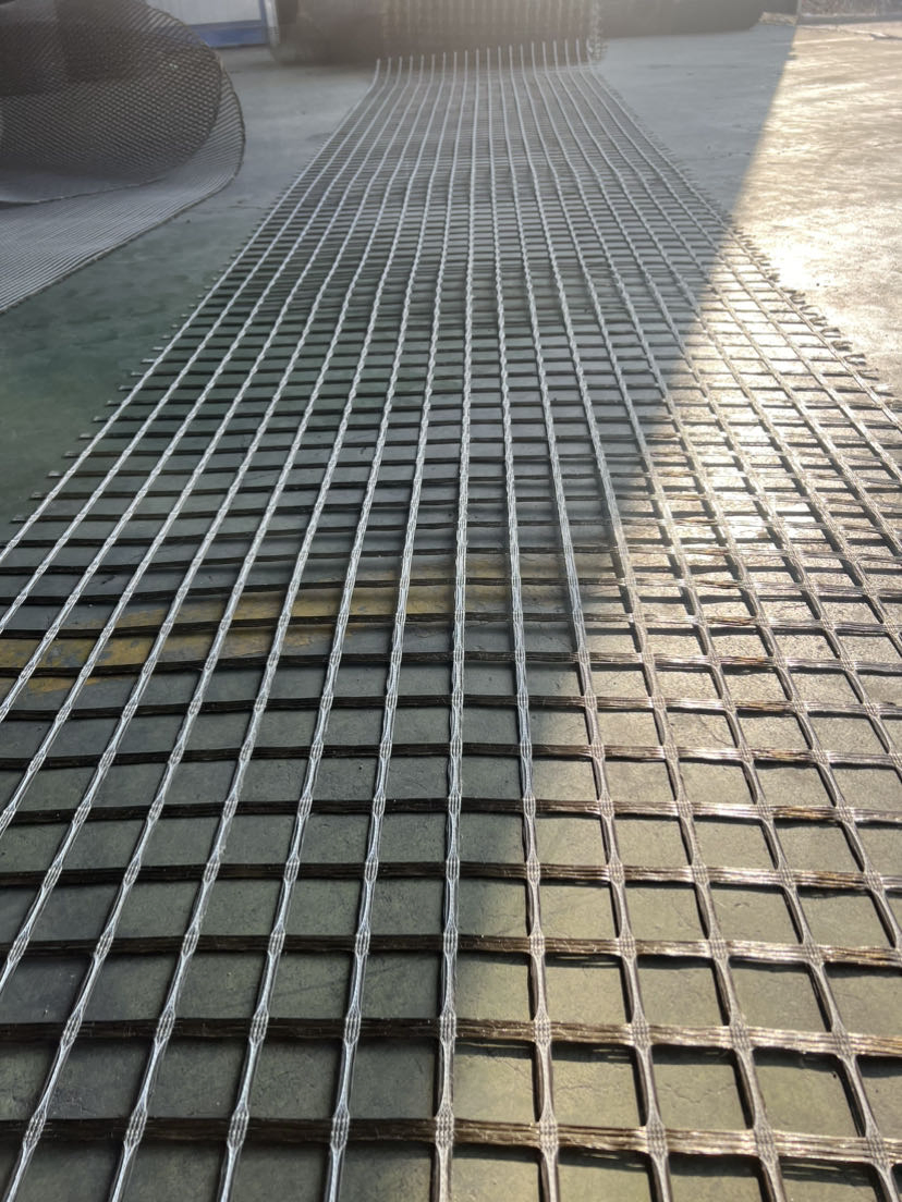 Bitumen Coating Fiberglass Geogrid Asphalt Reinforcement Fiberglass Geogrid Price