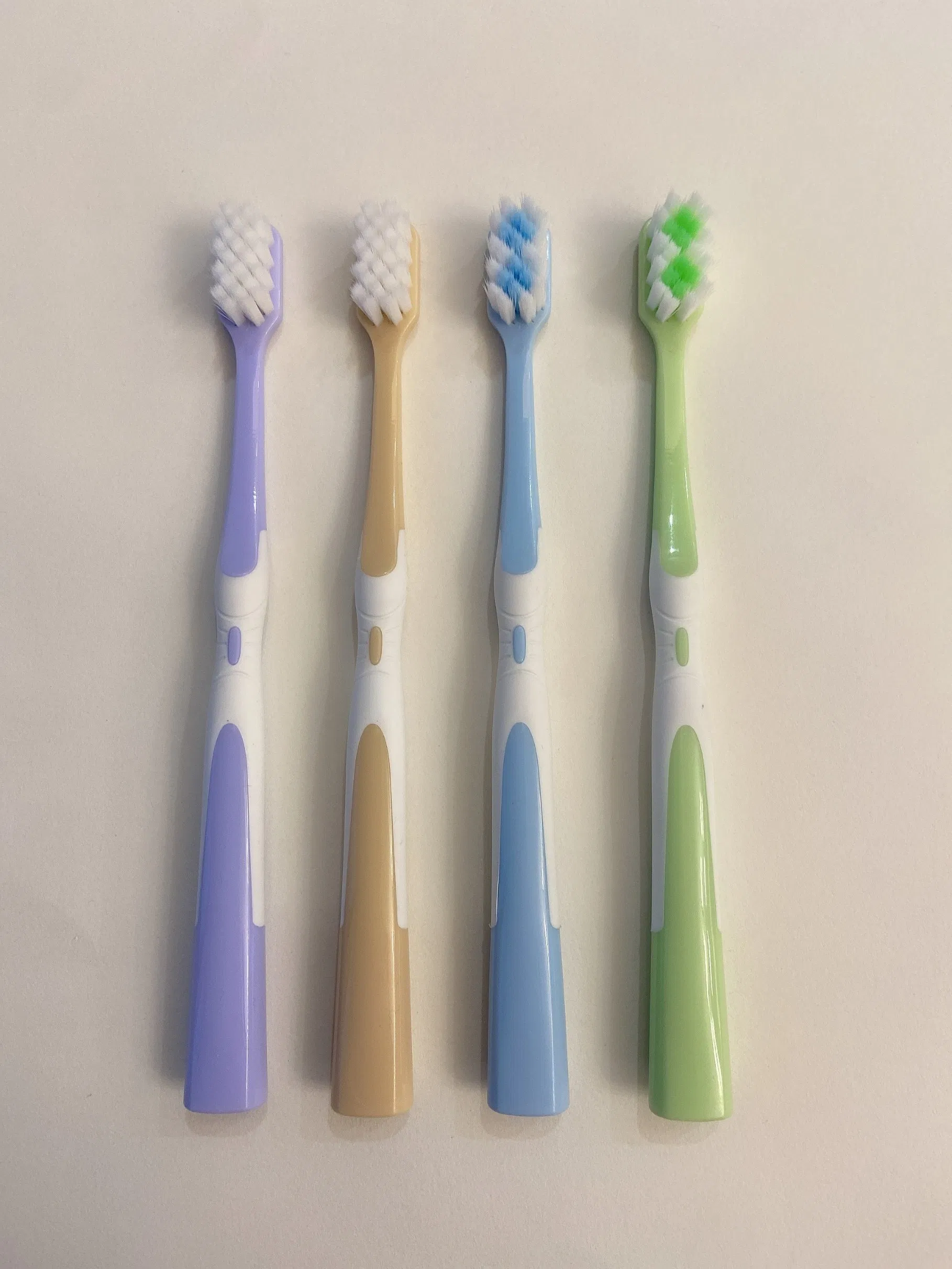 FDA Ultra Soft Square Tufting Holes PP+TPE Adult Toothbrush