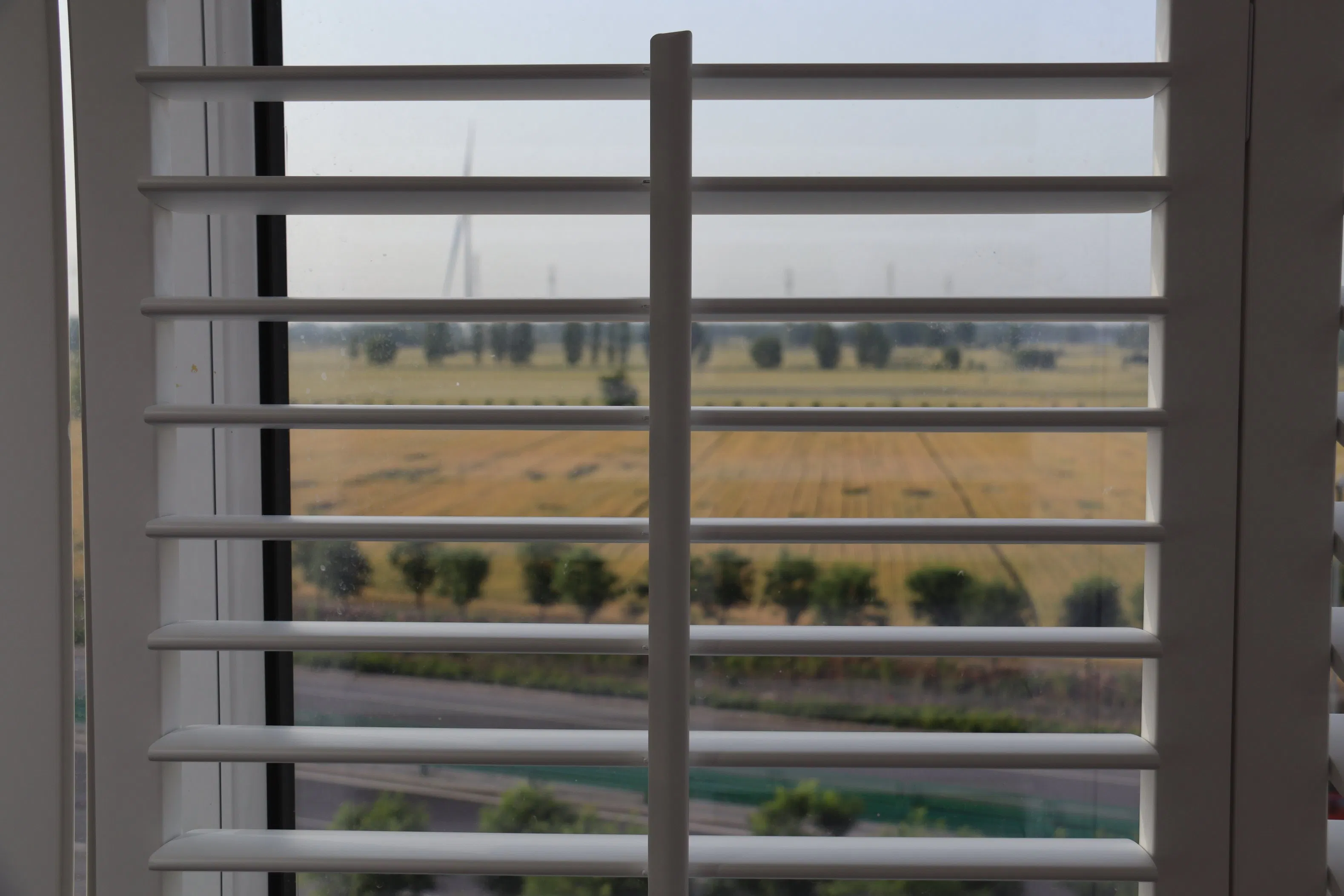 Custom Shaped Plantation Shutters for Specialty-Shaped Windows