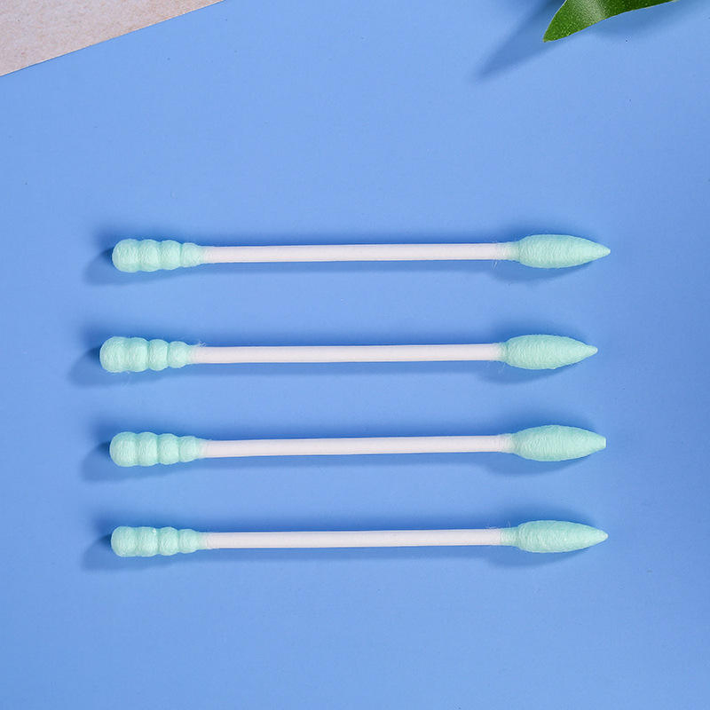 200 Pieces of Cotton Swabs with Green Cotton Tips Packed in a Frosted Square Box.
