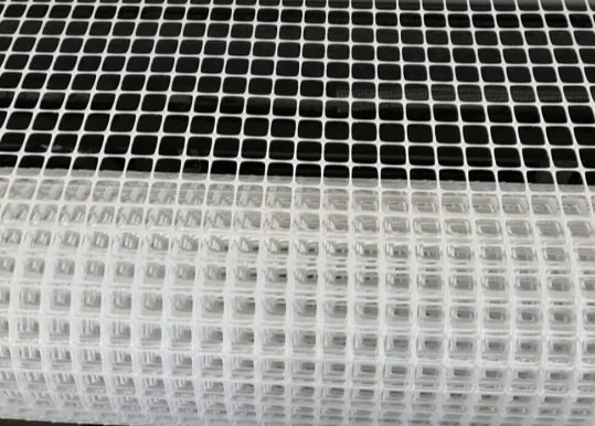 Warp-Knitting Biaxial Uniaxial Polyester Reinforced Composite Fiberglass Geogrid Nonwoven for Reinforcing Pavement Concrete Road Low Price