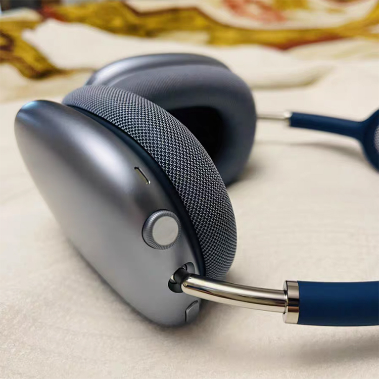 The New Max Wears Noise-Canceling Wireless Headphones