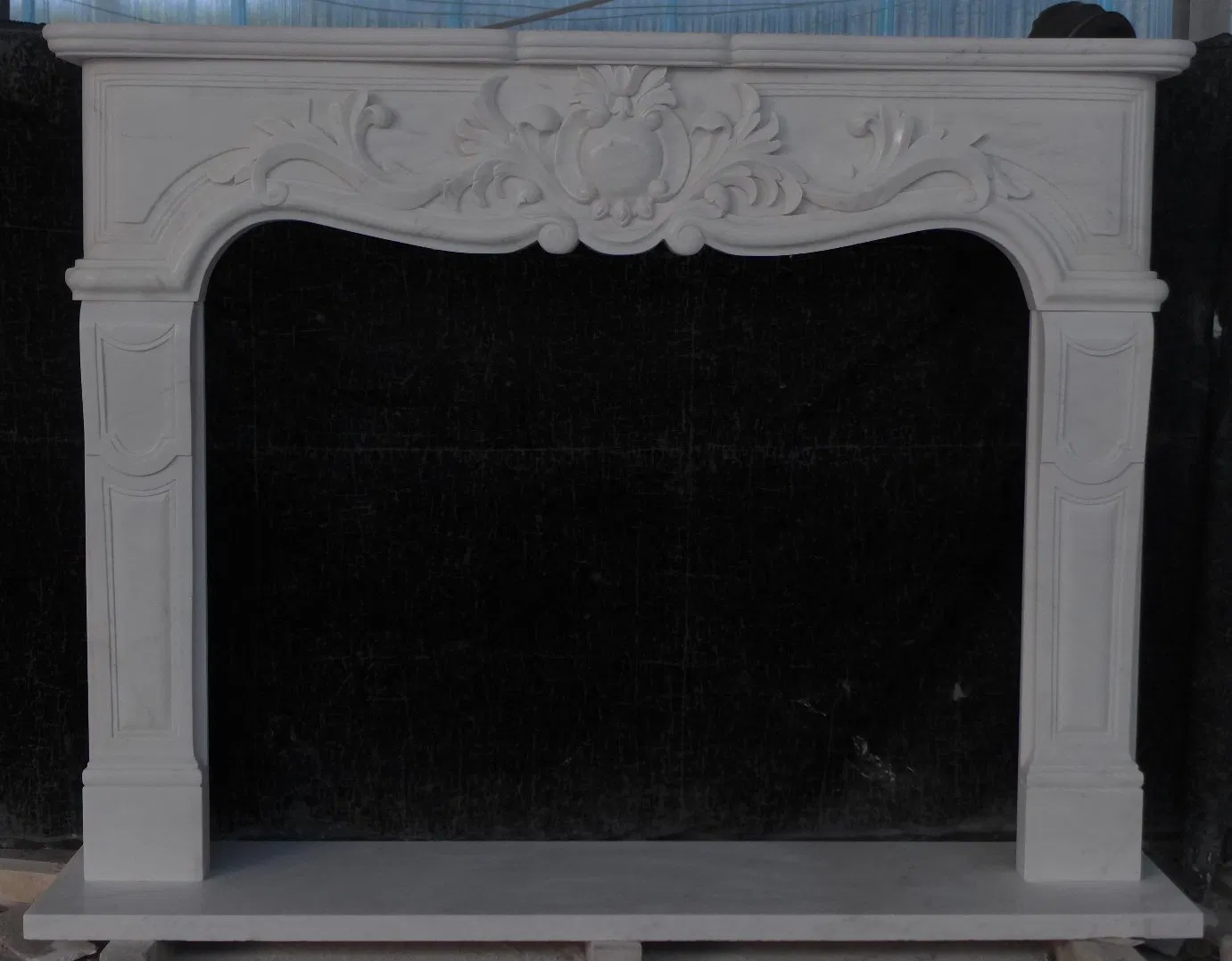 Indoor Carved Cultured Marble Fireplace