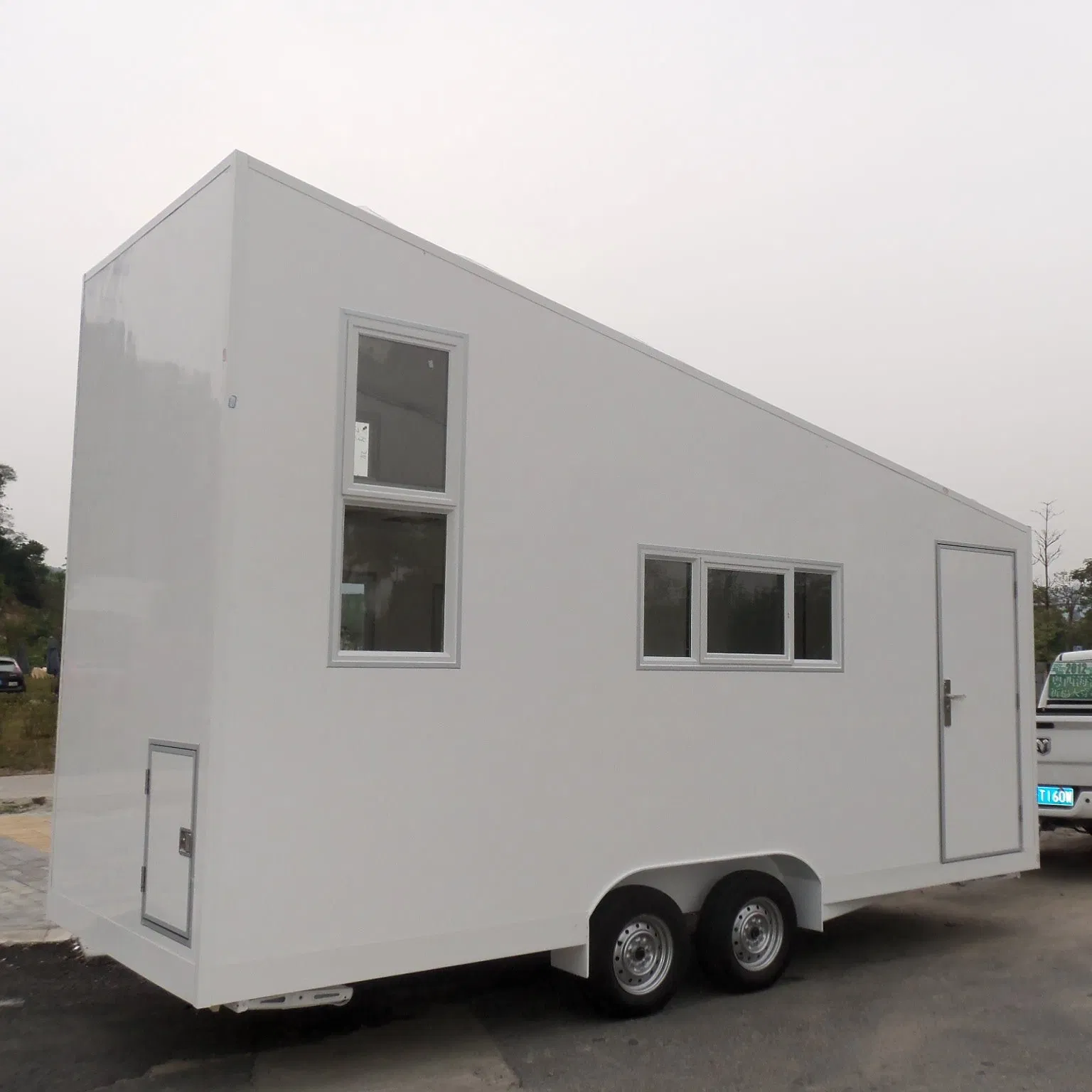 Movable Prefab Light Steel Fiberglass Caravan Camper/Trailer House.