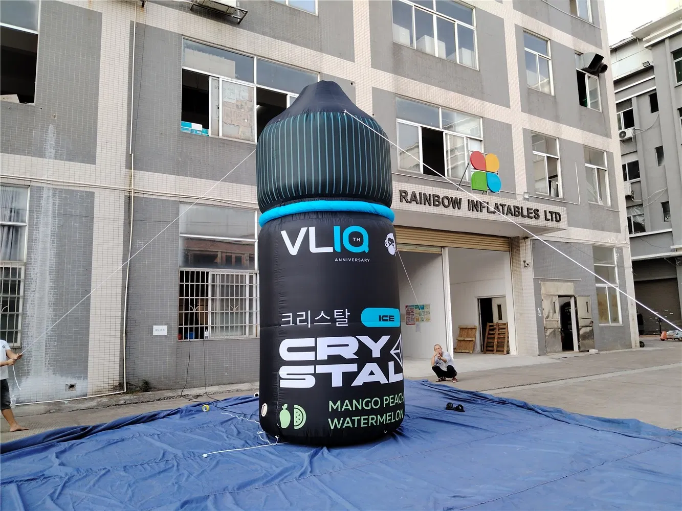 Giant Inflatable Bottle-Shaped Advertisement for Brand and Product Promotion