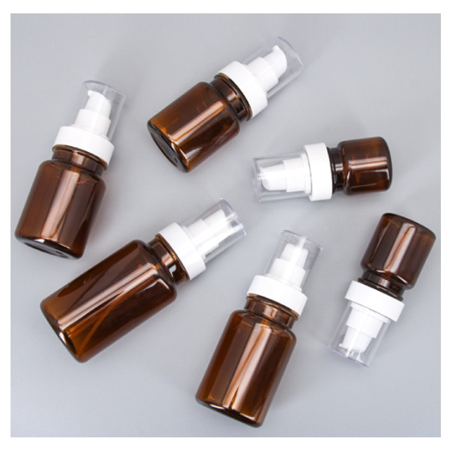 in Stock Lotion Pump Spray Make-up Packaging Bottles Transparent Tawny Plastic Round Spray Bottles