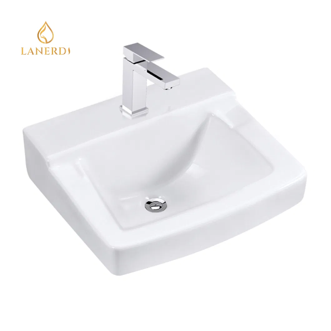 Керамическая раковина с краном для ванной комнаты