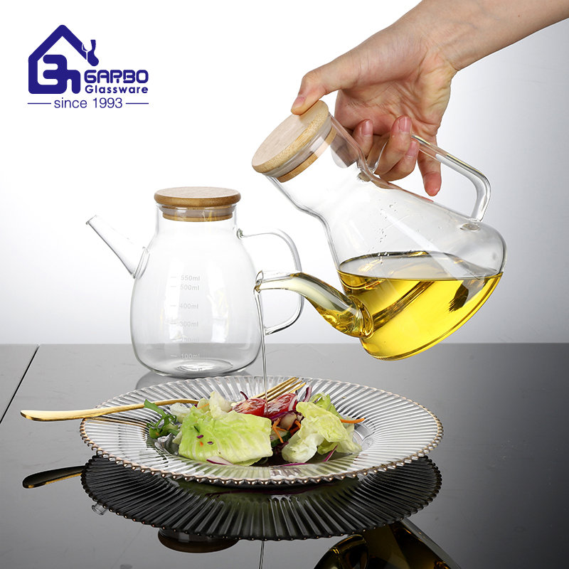 Wholesale Heat Resistant Bamboo Cover Kitchen 600ml Borosilicate Glass Oil Bottle with Silicone Dust Plug