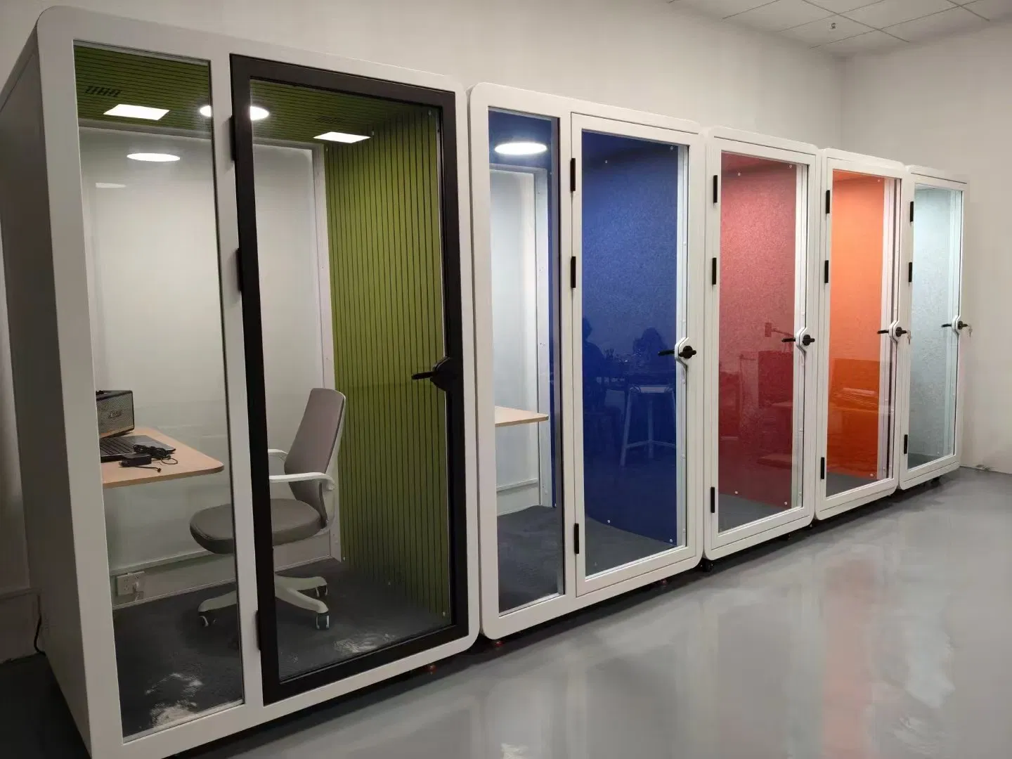 a Telephone Booth and Soundproof Booth Beside The Office Pod for The Focused Work Pod
