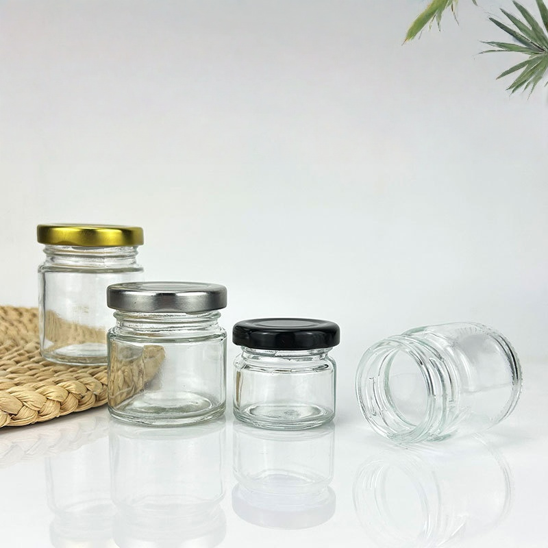 Hot Sale 50ml 80ml Mini Glass Jar Honey Jar Fashion Mason Jar Pickle Jam Honey Food Storage Round Empty Glass Jar with Metal Lid