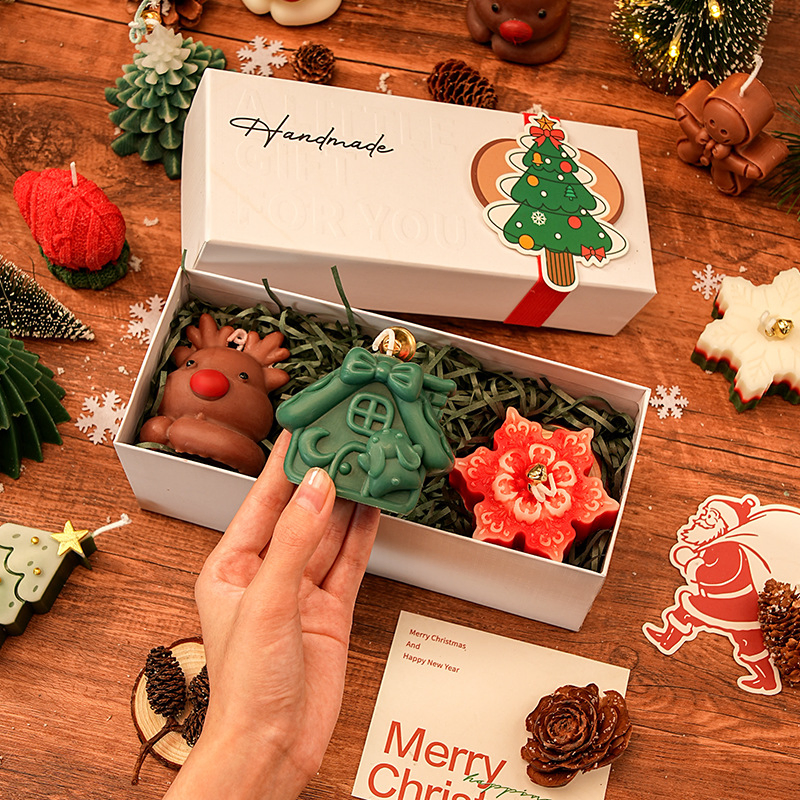 Festive Holiday Candles with Colorful Designs for Gifting