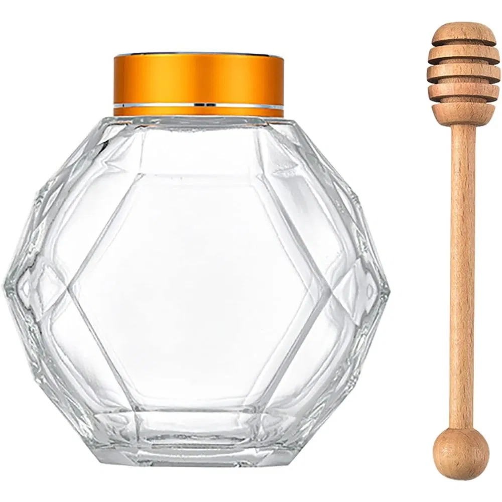 Банка для меда с деревянной ложкой и пробковой крышкой